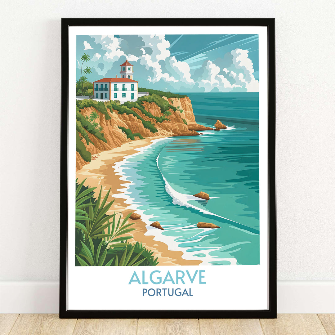 A white cliffside villa sits above a golden sandy beach and turquoise ocean in this Algarve travel poster from MapYourDreams, shown framed in a sleek black display frame for modern living room decor.
