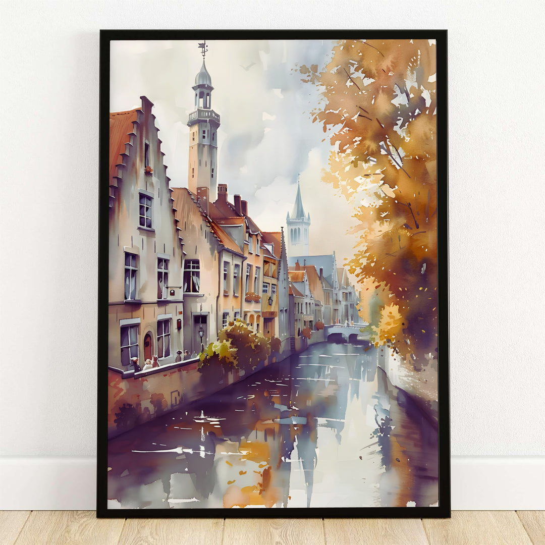 A soft watercolor art print depicting an autumn canal scene in Bruges, Belgium, with step-gabled medieval townhouses, tall church spires, and golden fall foliage reflected on the water surface. Offered by MapYourDreams, this artwork is available in flexible options including unframed paper, custom wooden frames, and gallery canvas wraps. 