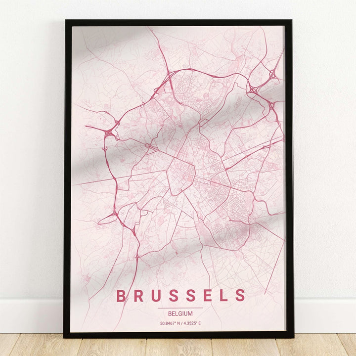 A chic blush pink street map print of Brussels, Belgium, displaying detailed dusty rose road lines against a soft pastel background. Offered by MapYourDreams, this artwork is available in flexible options including unframed paper, custom wooden frames, and gallery canvas wraps.