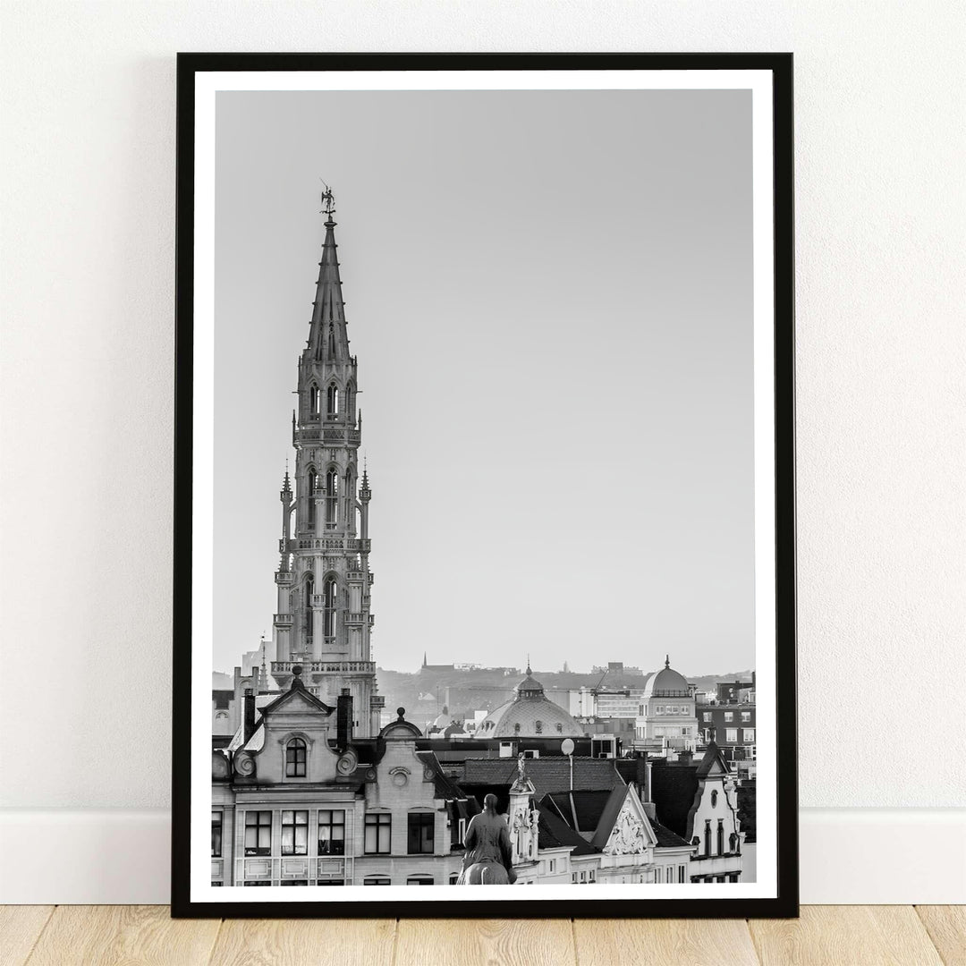A fine art black and white cityscape photography print featuring the majestic Brabantine Gothic spire of the Town Hall in Brussels, Belgium. Offered by MapYourDreams, this artwork is available in flexible options including unframed paper, custom wooden frames, and gallery canvas wraps.