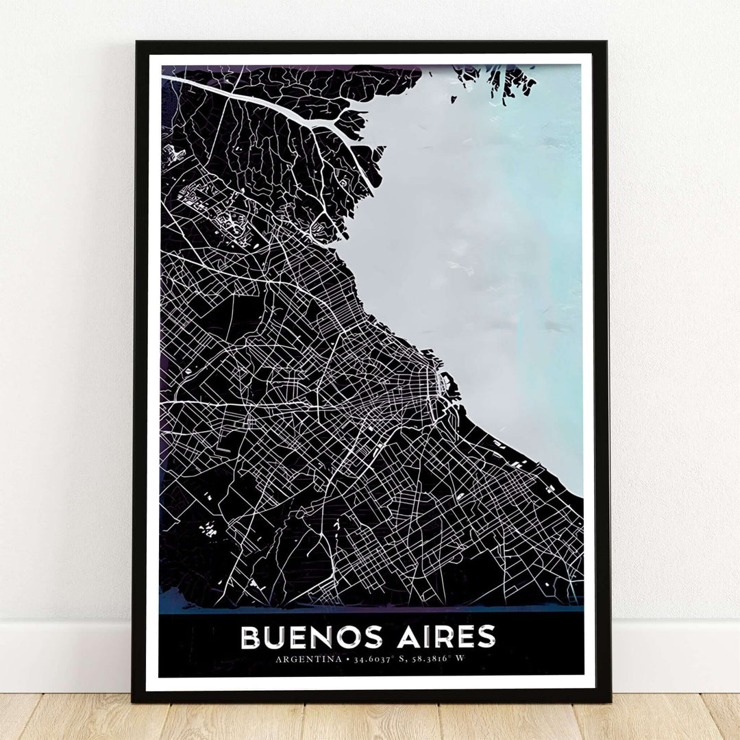 Buenos Aires black and icy blue map poster print displaying the detailed city street grid in white against dark land and light blue water with coordinates. Crafted by MapYourDreams, this design can be ordered as borderless archival paper, custom wooden frames, or gallery canvas wraps.