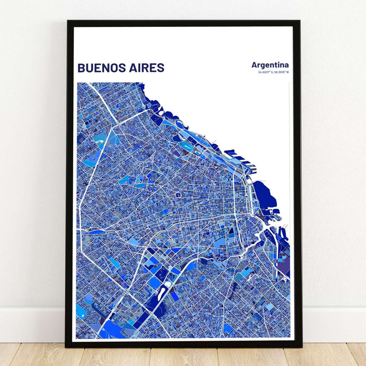 Buenos Aires blue geometric map art print displaying a mosaic city grid in cobalt, indigo, and azure tones alongside the white riverfront. Crafted by MapYourDreams, this design can be ordered as borderless archival paper, custom wooden frames, or gallery canvas wraps.