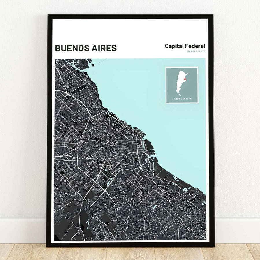 Buenos Aires charcoal and mint map print displaying the detailed city street grid in white against dark land and soft mint green water with coordinates. Crafted by MapYourDreams, this design can be ordered as borderless archival paper, custom wooden frames, or gallery canvas wraps.