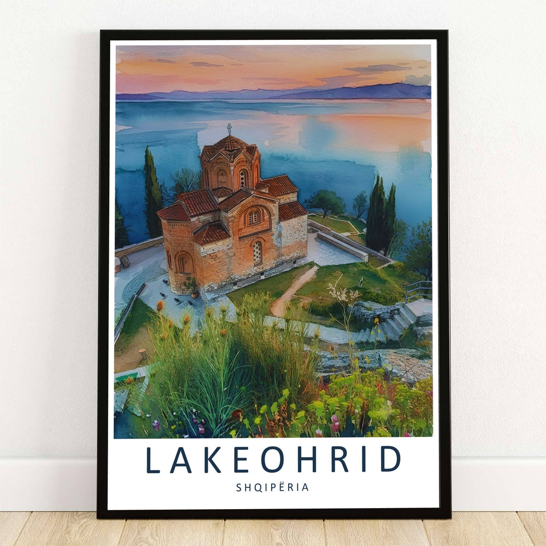 Glowing sunset skies cast warm peach and lavender tones over Lake Ohrid, illuminating the historic cliffside Church of Saint John at Kaneo in this watercolor print. Offered by MapYourDreams, this artwork is available in flexible options including unframed paper, custom wooden frames, and gallery canvas wraps.