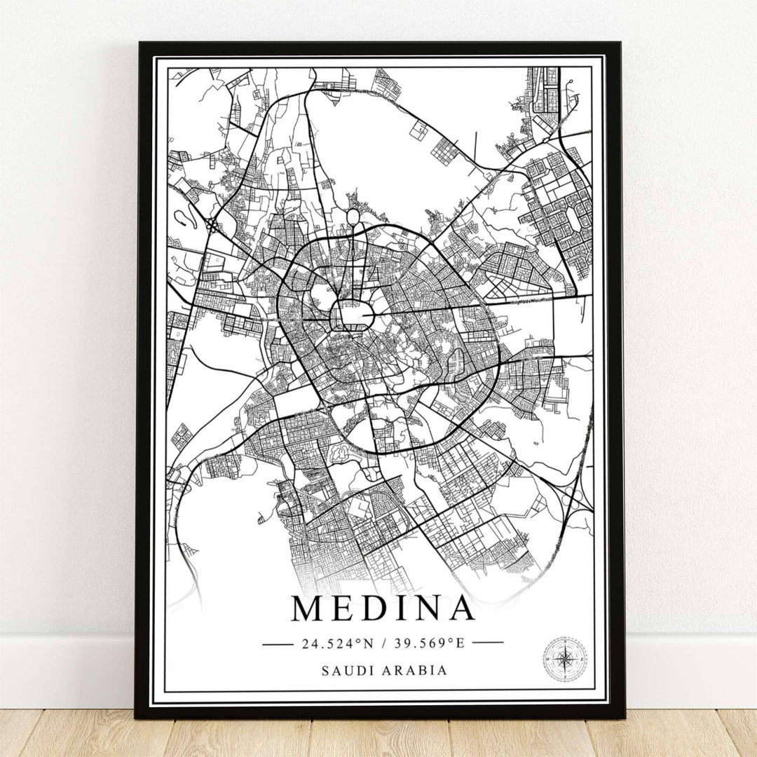Modern minimalist black and white cartographic art print of Medina Saudi Arabia featuring crisp vector city street lines on a white background. Offered by MapYourDreams, this artwork is available in flexible options including unframed paper, custom wooden frames, and gallery canvas wraps for room decor.