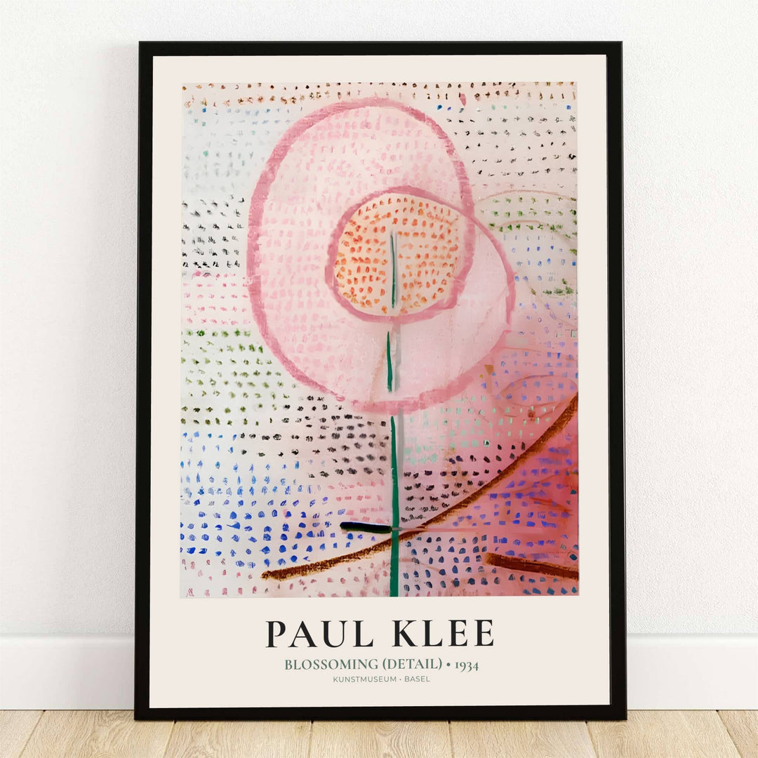 Housed within the esteemed collections of the Kunstmuseum Basel in Switzerland, this delicate Paul Klee Blossoming Detail (Blühend) 1934 print features a luminous pink blossom hovering over a slender stem amidst stippled fields. Offered by MapYourDreams, this artwork is available in flexible options including unframed paper, custom wooden frames, and gallery canvas wraps.