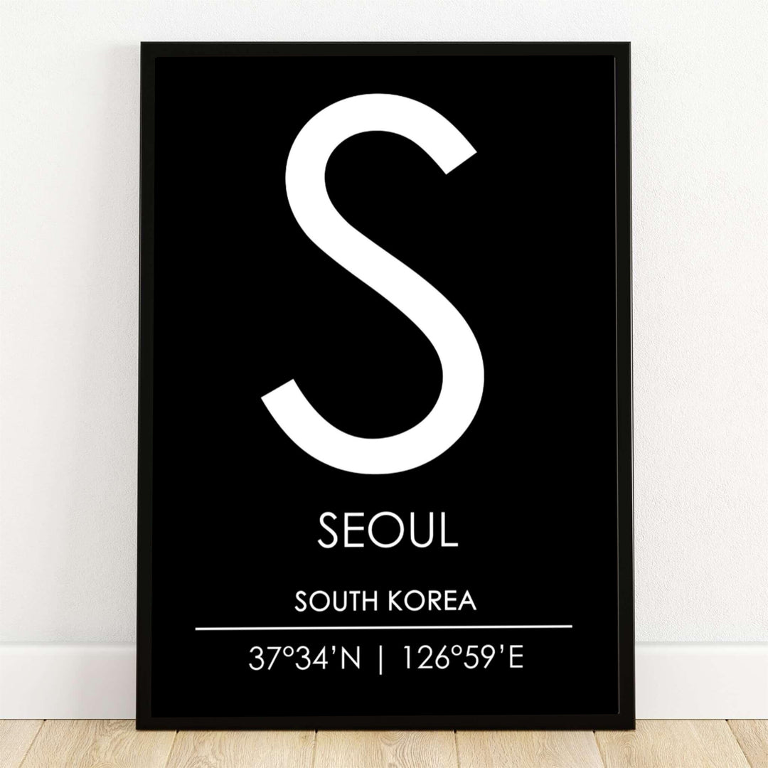 Minimalist black and white seoul south korea monogram art print showcasing a bold white S letter with city coordinates, presented by MapYourDreams with flexible display options including unframed archival paper, custom wooden frames, and gallery canvas wraps to effortlessly elevate your modern wall decor.