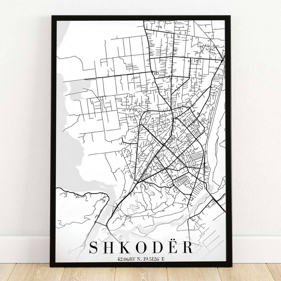Minimalist black linework outlines the urban streets and lake waterways of Shkodër, Albania, in this crisp white map poster. Offered by MapYourDreams, this artwork is available in flexible options including unframed paper, custom wooden frames, and gallery canvas wraps.