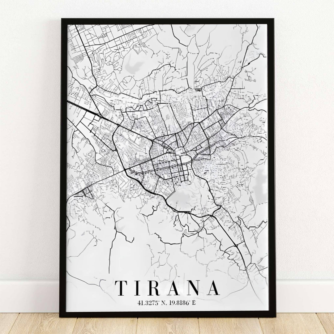 Minimalist black linework outlines the urban streets, major boulevards, and downtown blocks of Tirana, Albania, set against a clean off-white background. Offered by MapYourDreams, this artwork is available in flexible options including unframed paper, custom wooden frames, and gallery canvas wraps.