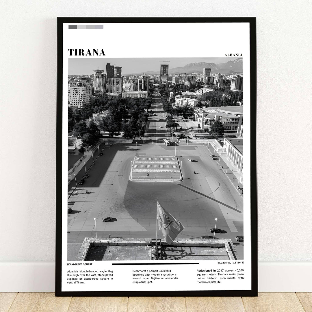 A high-angle aerial photograph of Sheshi Skënderbej in Tirana, Albania, captured in striking Black & White photography, highlights the vast stone plaza and national flag. Offered by MapYourDreams, this photo print is available in flexible options including unframed paper, custom wooden frames, and gallery canvas wraps.