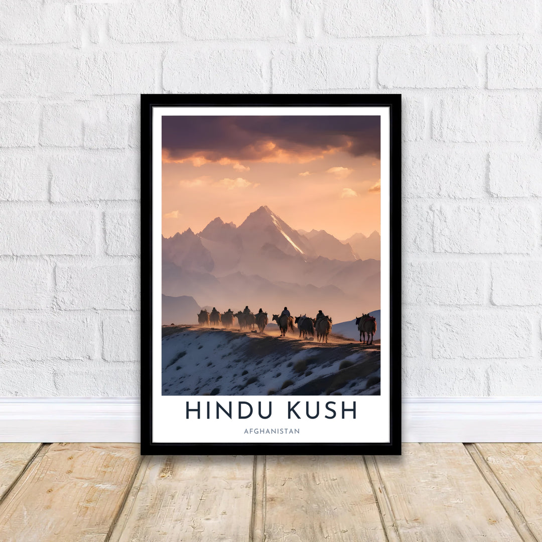 Majestic snow-capped Afghanistan Hindu Kush mountain print showcasing a Kuchi nomad caravan journey under a colorful evening sky, offered by MapYourDreams as an unframed fine art print, stretched gallery canvas, or custom framed wall art decor in classic black and natural wood frame finishes.