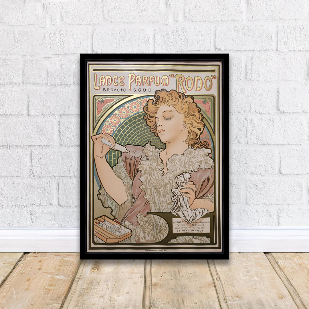 Traditional French vintage print Lance Parfum Rodo by artist Alphonse Mucha displaying ruffled dress details set in Paris France. MapYourDreams supplies framed, unframed, and canvas poster options for wall decor.