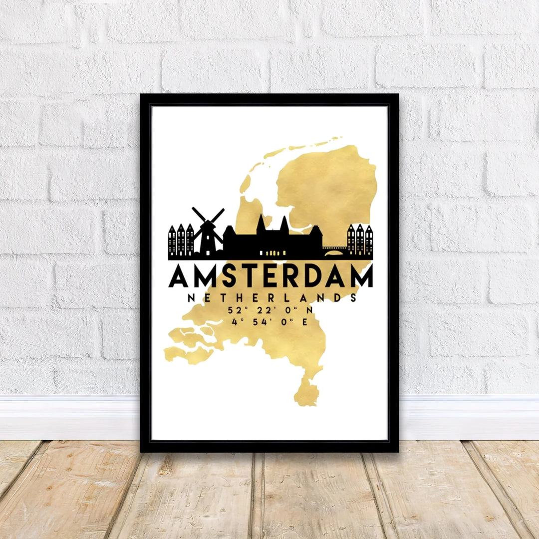 Modern gold cartography decor displaying the map outline of Holland and a black silhouette of traditional windmills and city gables, offered by MapYourDreams in flexible formats such as unframed paper prints, gallery wrapped canvas, or custom framing tailored to fit glam wall decor themes.
