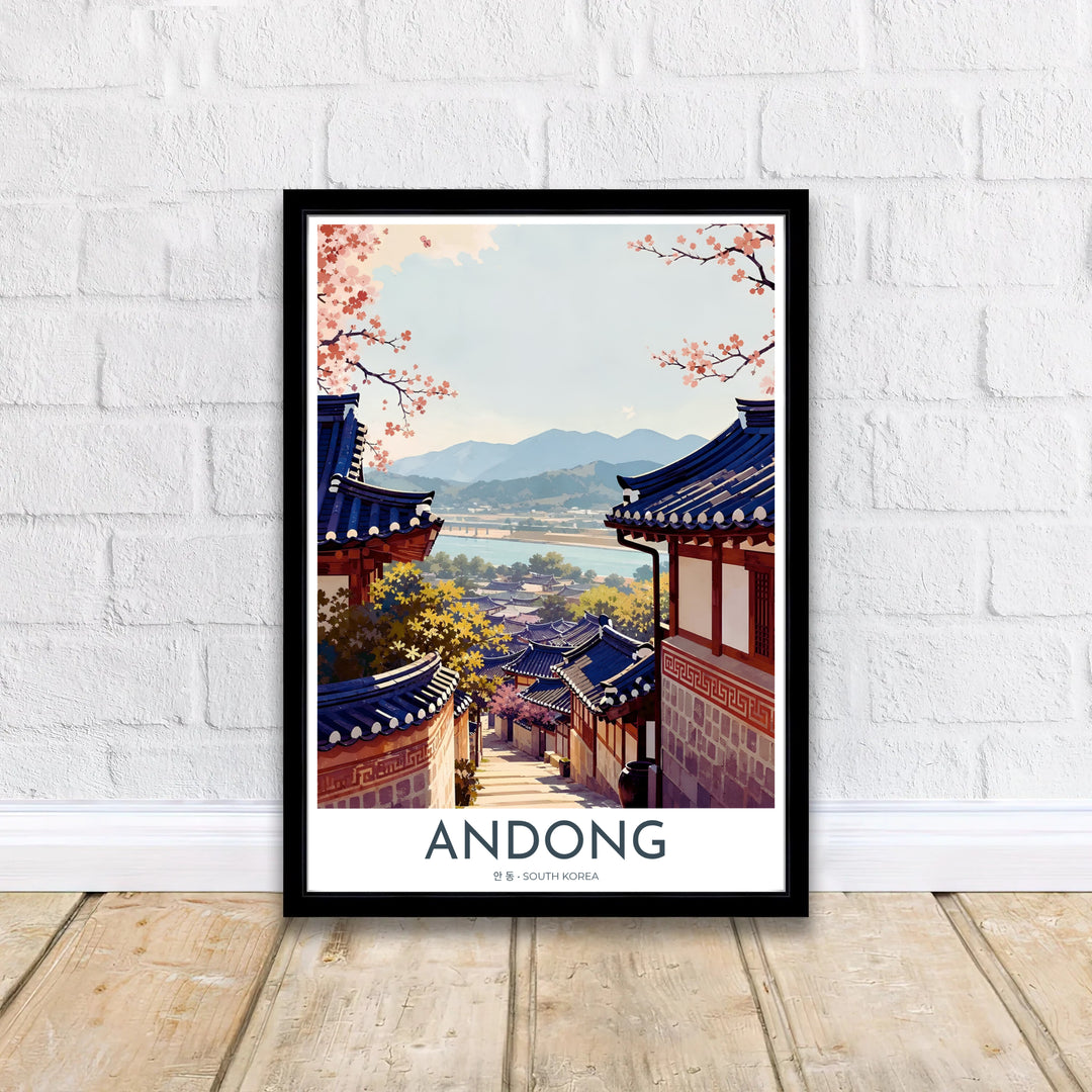 Traditional Korean village decor print featuring the scenic overview of Andong, South Korea, with deep blue roofs, terracotta accents, and soft pink spring foliage. Offered by MapYourDreams, this artwork is available in flexible options including unframed paper, custom wooden frames, and gallery canvas wraps.