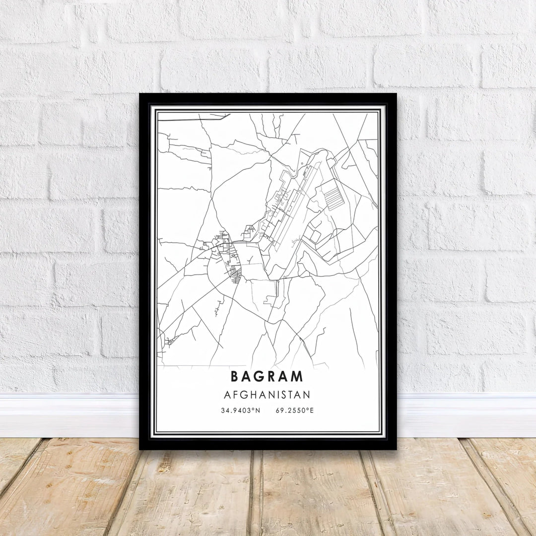 Bagram Afghanistan airfield map wall art poster featuring crisp vector lines and geographic coordinate details, offered by MapYourDreams as an unframed fine art print, stretched gallery canvas, or custom framed wall decor in classic black and natural wood frame finishes for workspace walls.