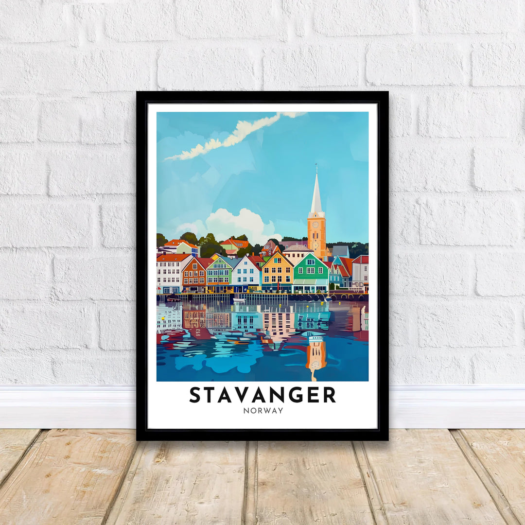 Nordic city travel print displaying the colorful Vågen harbor storefronts in Stavanger Norway under a clear blue summer sky with light clouds. Designed to complement contemporary spaces, this piece is produced in simple unframed poster paper, custom wood framed setups, and gallery stretched canvas art.