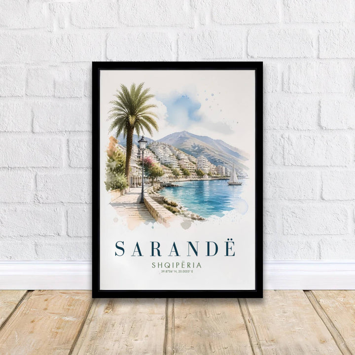 Crisp architectural details capture the resort town charm of Sarandë, balanced by fluid watercolor sky splatters and soft blue sea reflections above. Offered by MapYourDreams printed on archival matte paper with options for custom frames or canvas wraps to complete your gallery wall.