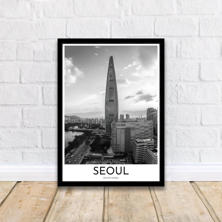 Fine art black and white photography poster capturing the impressive architectural height of Lotte World Tower in Seoul, available from MapYourDreams in options like unframed paper prints, custom wooden frames, and canvas that bring timeless photographic beauty to any gallery wall setup.