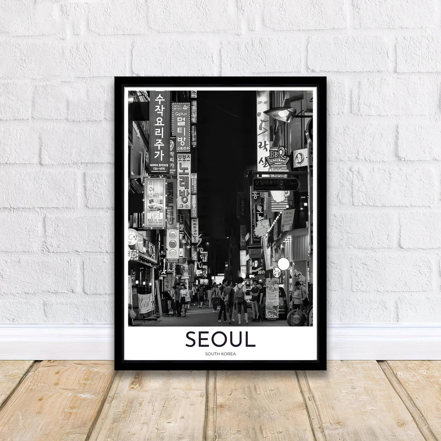 Fine art street photography poster highlighting illuminated Hangul storefronts in a night alley of Seoul South Korea, available from MapYourDreams in options like unframed paper prints, custom wooden frames, and canvas that add refined monochrome beauty to any home gallery wall layout.