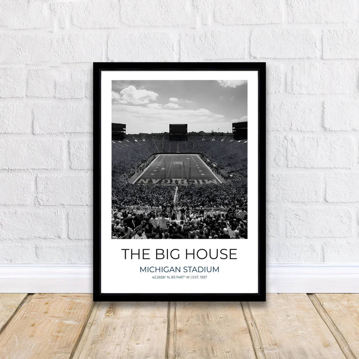 Classical college sports architecture poster featuring Michigan Stadium The Big House in Ann Arbor Michigan rendered in rich black and white. Supplied by MapYourDreams, this artwork is available in flexible options including unframed paper, custom wooden frames, and gallery canvas wraps for stylish decor.