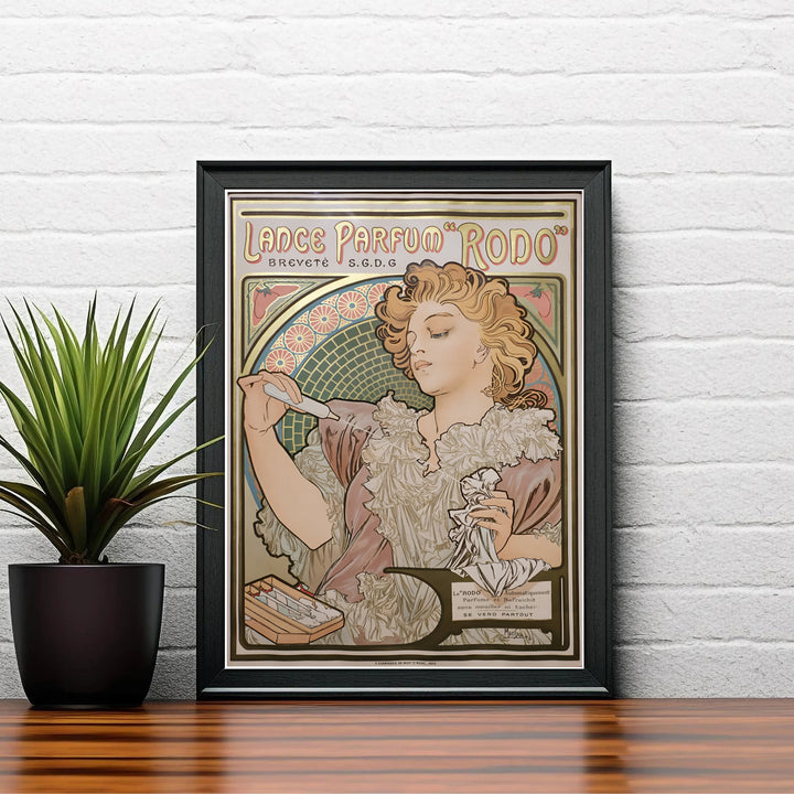 French Art Nouveau poster Lance Parfum Rodo by artist Alphonse Mucha showcasing a romantic female portrait in Paris France. Discover custom framed, unframed, and canvas print decor options at MapYourDreams.