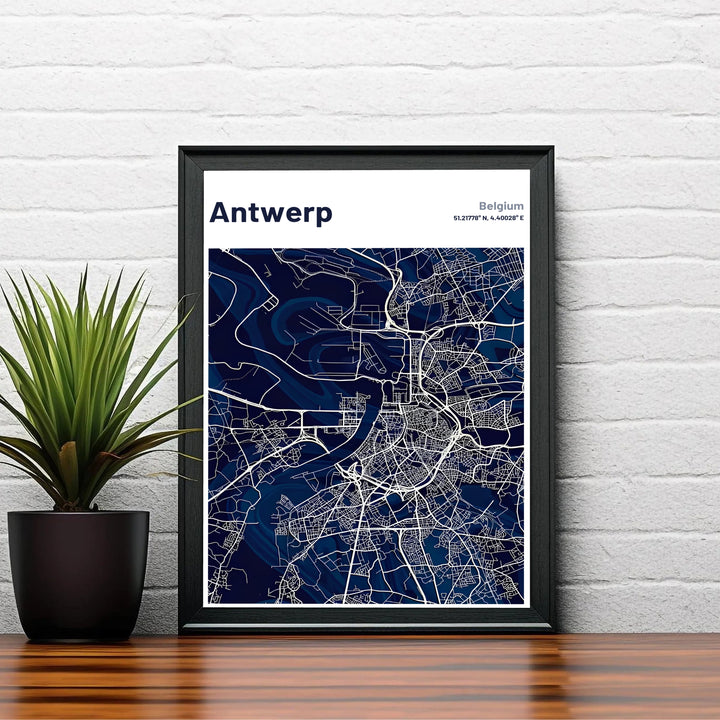 A high-contrast map print depicting the streets, bridges, and water channels of Antwerp, Belgium, set against a dark blue aesthetic. Choose your preferred finish from standalone unframed matte paper, custom decorative frames, or ready-to-hang gallery canvas options.