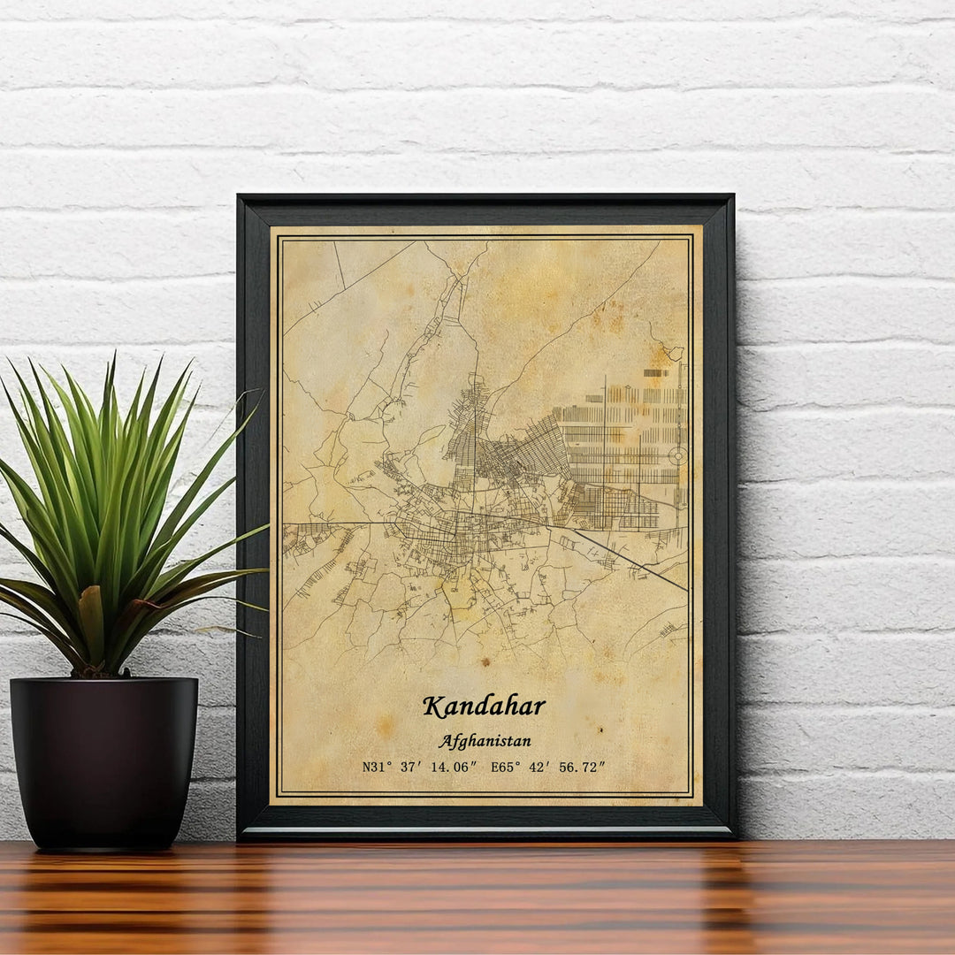 Cartographic wall decor print featuring the detailed urban layout and street paths across Kandahar, Afghanistan, set on a vintage distressed paper design. Created by MapYourDreams with choices including unframed prints, canvas wall art, or custom framed posters in white, bronze, and silver frame selections.