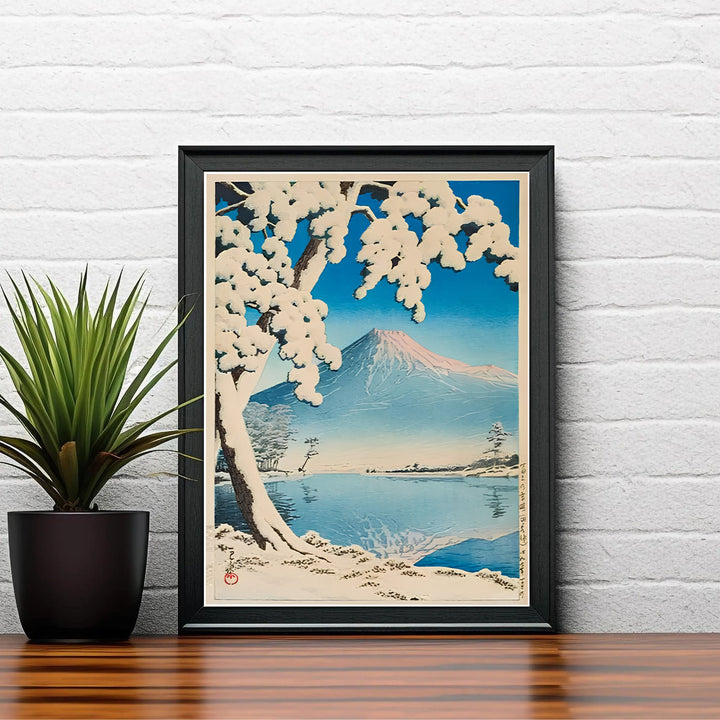 Vintage Japanese winter poster Lake Kawaguchi by artist Kawase Hasui displaying serene snow reflections at Lake Kawaguchi. Shop high-definition framed, unframed, and canvas art print choices at MapYourDreams.