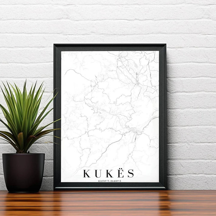 Featuring the native spelling KUKËS alongside geographic coordinates, this black and white road map print celebrates northeastern Albania&