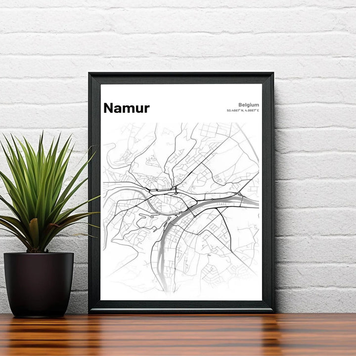 Artistic street layout design depicting the capital of Wallonia, Namur in Belgium, rendered in crisp black, white, and subtle grey river accents. Offered by MapYourDreams, this artwork is available in flexible options including unframed paper, custom wooden frames, and gallery canvas wraps.