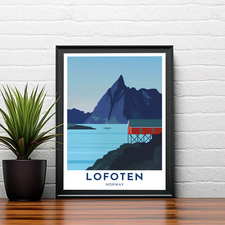 Minimalist coastal poster showing a red fishing cabin and distant sailboat against a sharp mountain peak in Lofoten Norway. Designed to suit any room aesthetic, this print is produced in simple unframed poster paper, custom wood framed setups, and gallery stretched canvas art.