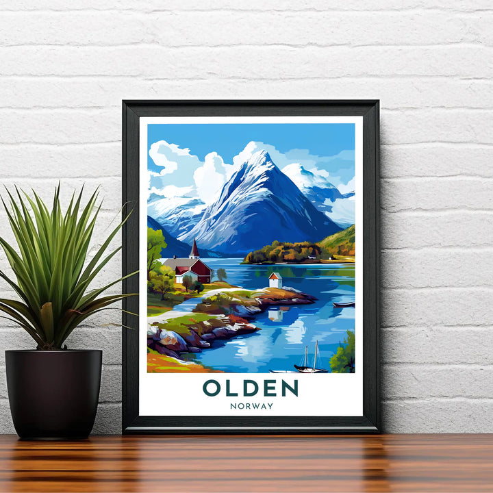 Panoramic travel print depicting Olden Norway with a red-roofed church spire overlooking smooth fjord waters and massive snowcapped mountains. Created by MapYourDreams, this fine art selection includes presentation formats like unframed poster paper, solid wood framed prints, and gallery canvas wraps.