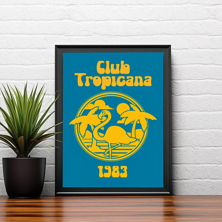 Vintage style 1983 Club Tropicana graphic print displaying rounded bubble typography and a yellow flamingo circle emblem, created by MapYourDreams with options for unframed poster prints, stretched canvas wall art, or custom frames in retro black and retro white moulding.