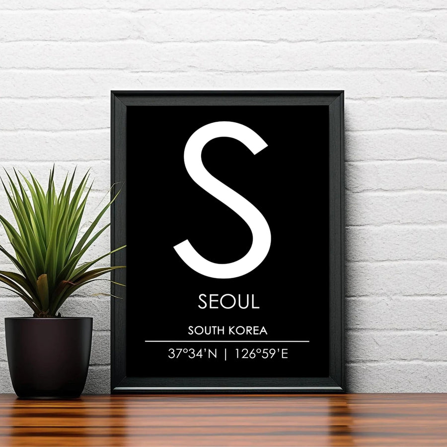 Stylized black background seoul monogram print with clean geographic text, produced by MapYourDreams in flexible choices including unframed poster prints, natural wood frames, and canvas wraps tailored to enhance modern bedroom, workspace, or entryway wall arrangements.