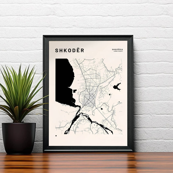 Clean black vector linework and solid water shapes create a striking cartographic layout of the Shkodër region on a soft off-white archival print surface. Order this artwork in your preferred style, such as an unframed paper print, a sleek wood frame, or a stretched canvas wrap.