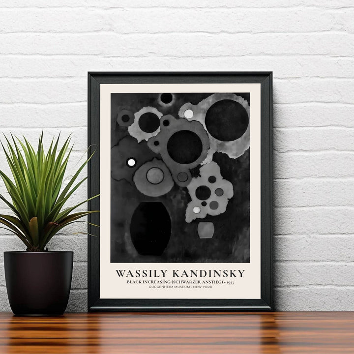 The harmonious blend of heavy black shapes and subtle gray gradients in Wassily Kandinsky&