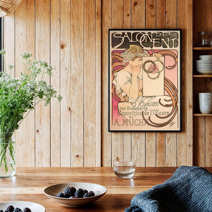 Authentic 1897 Parisian exhibition poster Salon Des Cent by artist Alphonse Mucha featuring organic floral linework at 31 Rue Bonaparte Paris. Shop high-definition framed, unframed, and canvas art print choices at MapYourDreams.