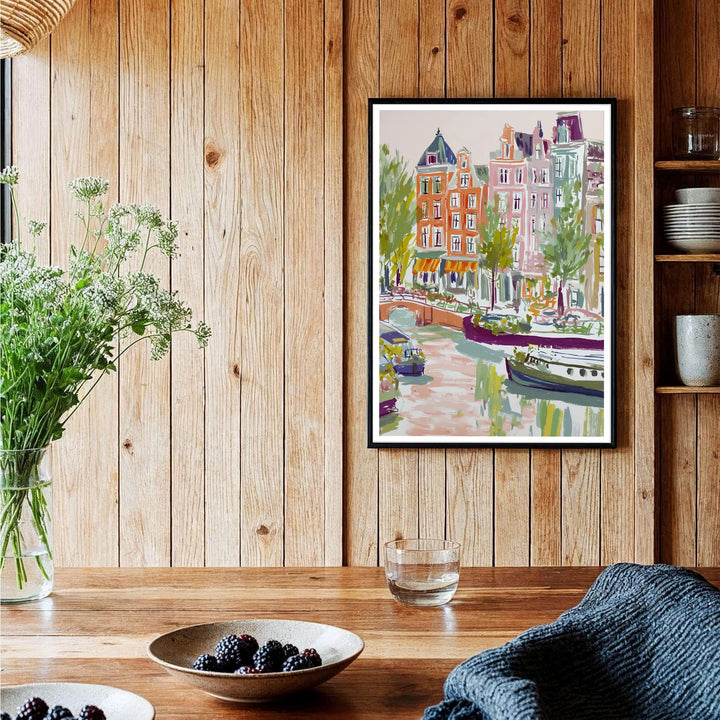 Soft pastel cityscape poster of Amsterdam canal houses and reflection-dappled water, provided by MapYourDreams in versatile choices including unframed paper, gallery wrapped canvas, or custom frame configurations in retro black, pure gold, and natural wood for bedroom styling.