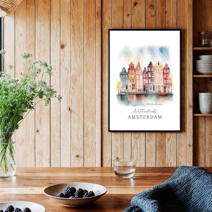 Whimsical watercolor city poster of historic Amsterdam canal architecture fronted by water reflections and flying birds, provided by MapYourDreams with available options like unframed paper prints, gallery canvas, or custom frame finishes in natural wood, pure gold, and bronze for offices.