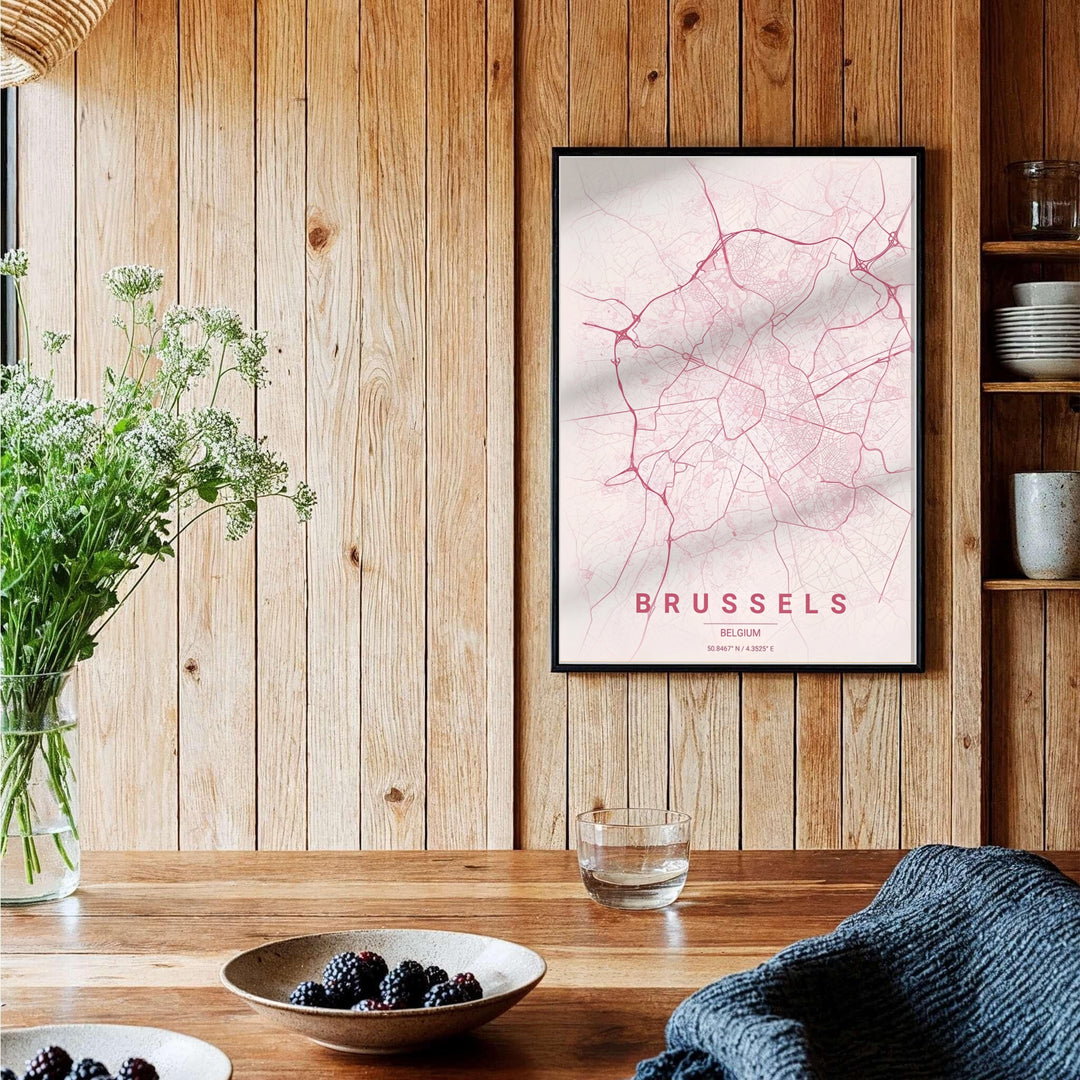 Refined street map artwork depicting the capital city of Brussels, Belgium, rendered in a blush pink minimalist graphic style. Choose your preferred finish from standalone unframed matte paper, custom decorative frames, or ready-to-hang gallery canvas options.