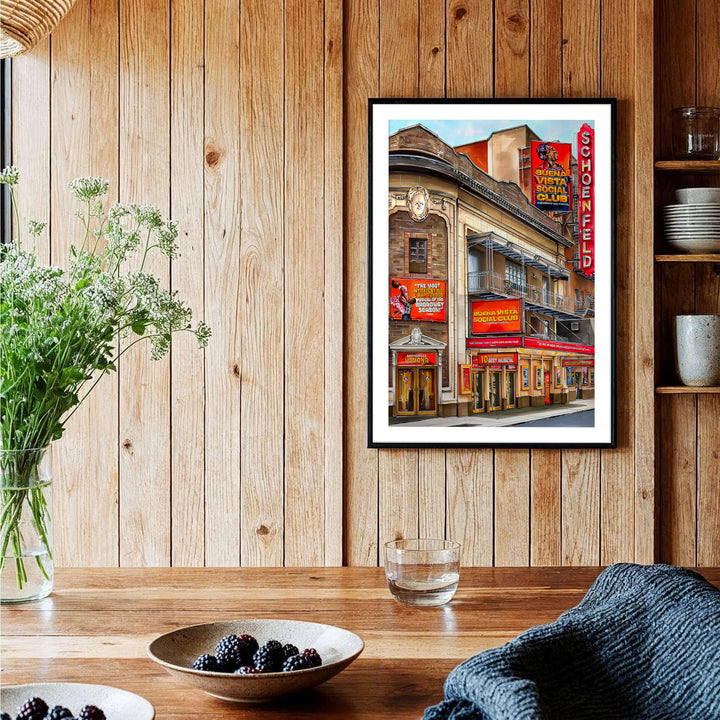 Crimson red and warm terracotta poster of the Gerald Schoenfeld Theatre on Broadway featuring intricate balcony details and marquee lighting, provided by MapYourDreams with available options like unframed paper prints, gallery canvas, or custom frame finishes in natural wood, pure gold, and bronze.