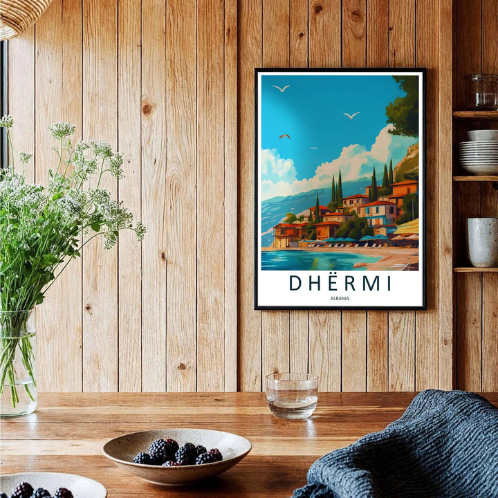 Bold retro travel poster depicting the beach resort town of Dhërmi with parasols on the sand and blue mountain hills rising behind. Offered by MapYourDreams, this artwork is available in flexible options including unframed paper, custom wooden frames, and gallery canvas wraps.