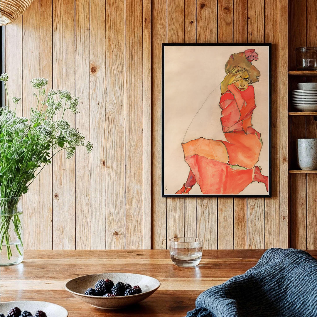 Fine art giclée watercolor poster of Egon Schiele Kneeling Female In Orange Red Dress 1910 preserved in Leopold Museum Vienna with warm neutral cream hues. MapYourDreams offers versatile framed wall art, unframed poster prints, and stretched canvas choices for complete room decoration projects.