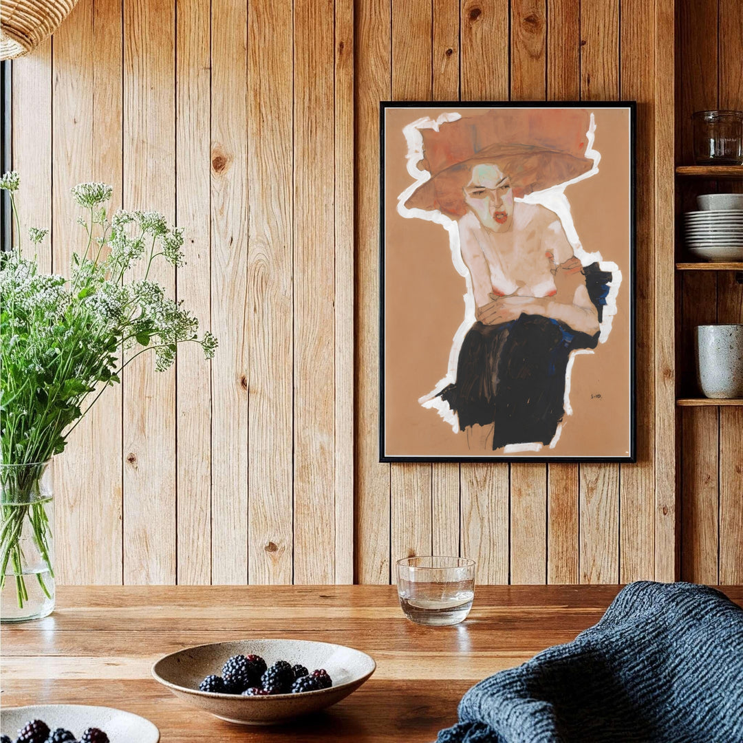 Authentic 1910 gouache poster of Egon Schiele Seated Woman With Hat from Vienna Austria with rich terracotta and dark charcoal pigments. Order custom framed prints, unframed paper wall poster art, or gallery canvas options from MapYourDreams to elevate your favorite interior space.