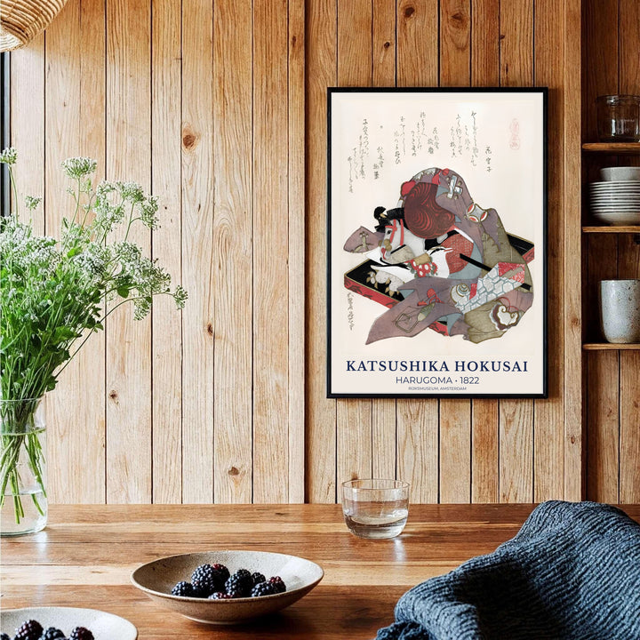 Vintage Japanese woodblock poster by artist Katsushika Hokusai displaying silk robes and a hobby horse toy in Amsterdam. Shop high-definition framed, unframed, and canvas art print options at MapYourDreams.