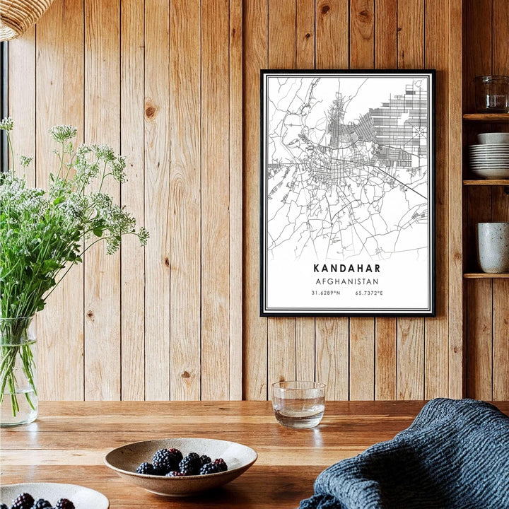 Vector cartography wall decor print featuring the urban street paths across Kandahar, Afghanistan, framed by double accent lines. Created by MapYourDreams with choices including unframed prints, canvas wall art, or custom framed posters in white, bronze, and silver frame selections.