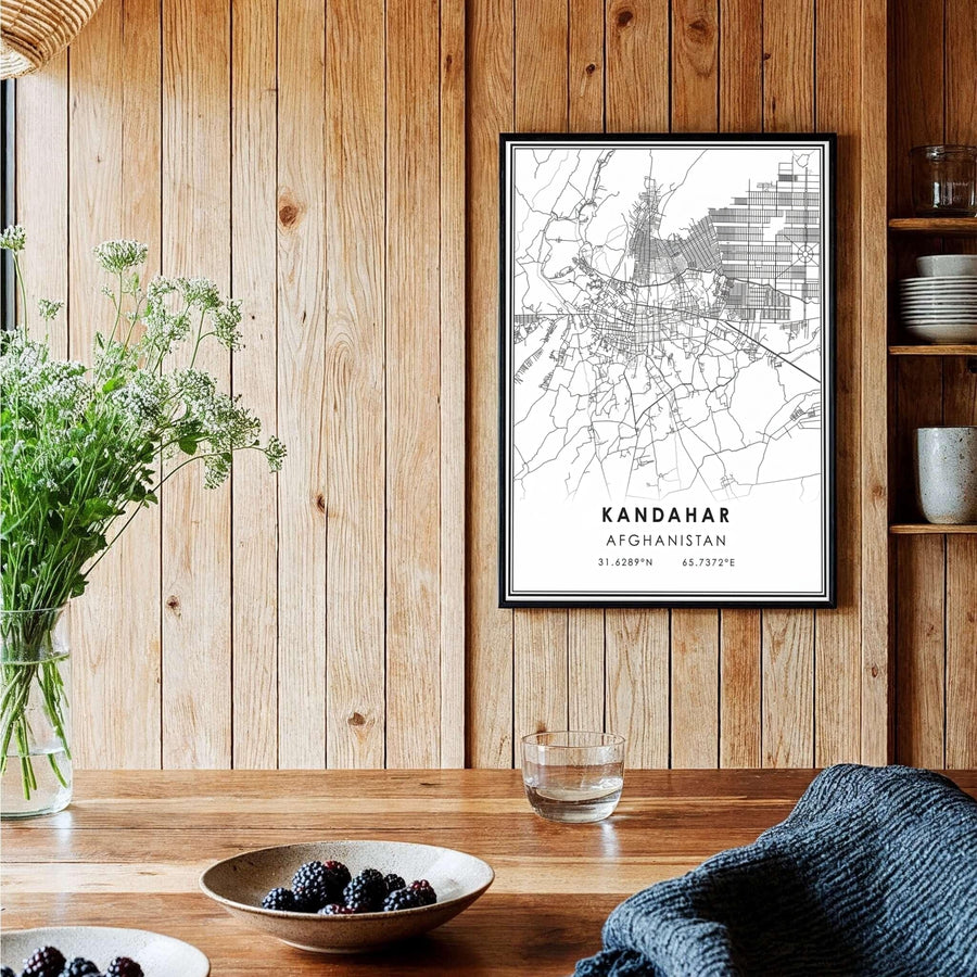 Vector cartography wall decor print featuring the urban street paths across Kandahar, Afghanistan, framed by double accent lines. Created by MapYourDreams with choices including unframed prints, canvas wall art, or custom framed posters in white, bronze, and silver frame selections.