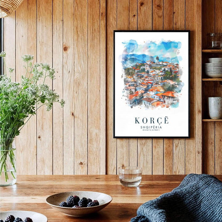 A captivating European travel poster illustrating Korçë Old Town, framed by clean white borders and elegant cartographic coordinates. Choose from several presentation options including unframed paper, custom frames, and gallery canvas wraps.
