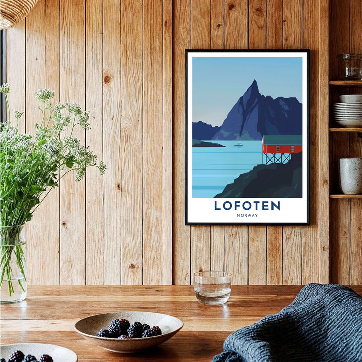 Clean Scandinavian landscape print of Lofoten Norway with flat color vectors depicting a red cabin, calm fjord water, and a mountain peak silhouette. Decorate your office or home with this artwork, available in lightweight unframed paper, protective framed designs, or gallery wrap canvas options.