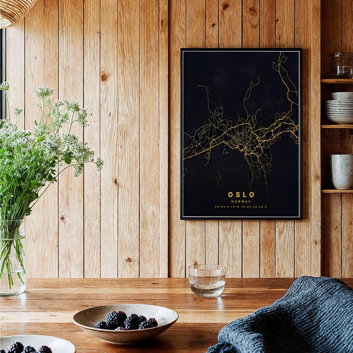 Metallic gold cartography artwork illustrating the central urban district and street routes of Oslo Norway on a deep black canvas background. Enhance your office space with options including unframed archival paper prints, custom wood framed artwork, and gallery quality canvas wraps.